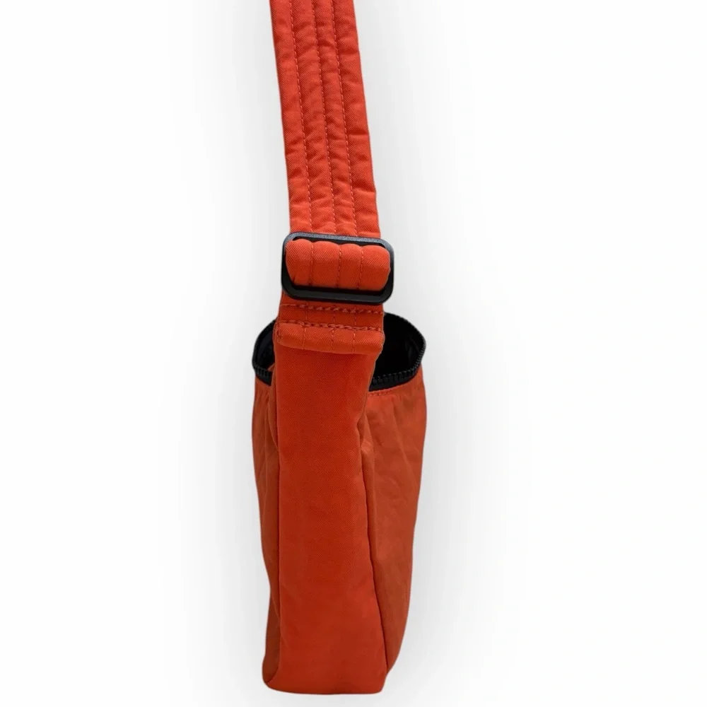 Orange Shoulder Bag with Minimal Silhouette and Adjustable Strap - Picture 2 of 10